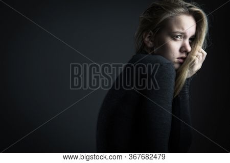Young woman suffering from a severe depression/anxiety