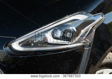 Novosibirsk/ Russia - May 03 2020:  Toyota Sienta, Glowing Headlight Of A Modern Car Close-up