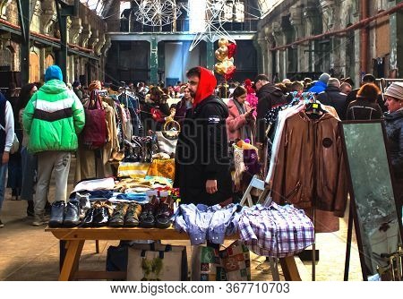 Lviv, Ukraine - February 16, 2020 : People Shopping On Garage Sale In Lem Station, Tlum And Cram. Hi