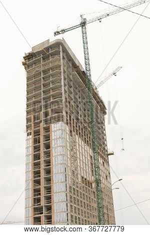 The Stopped Construction Of A High-rise Building. Unfinished Floors Of A Multi-storey Building Witho