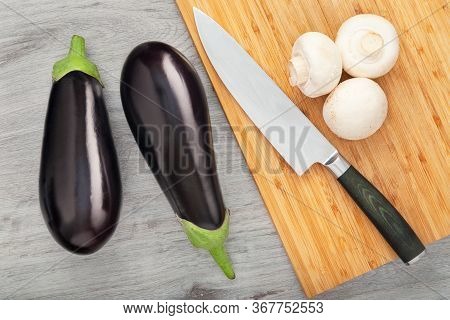 Fresh Vegetables Igridients On Wooden Table. Vegan Food Preparation Concept. Flat Lay View.