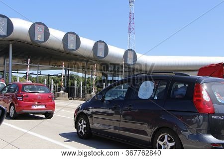 Saint Arnoult En Yvelines - France, August 06 : Cars Waiting To Pay Toll To Get Off The Highway, Aug