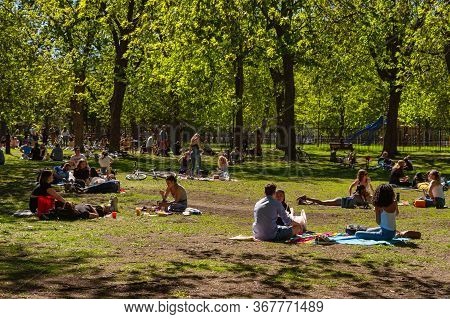 Montreal, Ca - 23 May 2020 : People Gathering During Coronavirus Pandemic In Laurier Park