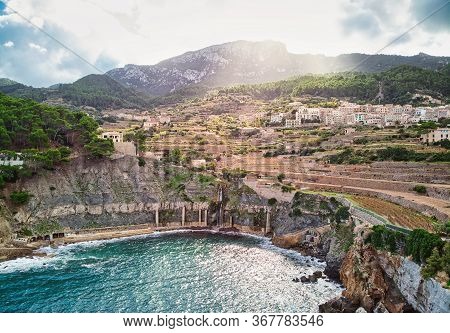 Picturesque Cove Mediterranean Sea Bay Lagoon View Hillside Houses In Small Spanish European Village