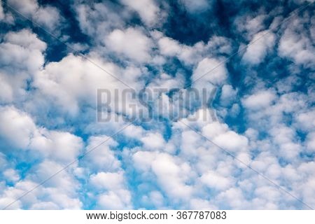 Blue Sky Background With White Clouds. Beautiful Cloud Scape. Altocumulus Clouds