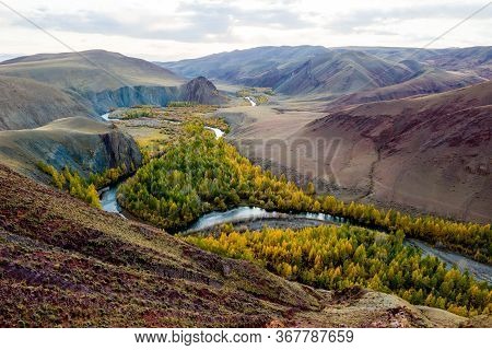 Beautiful Sun Valley And The Open River Kyzyltan Between The Mountains With Lush Clouds. Autumn Fore