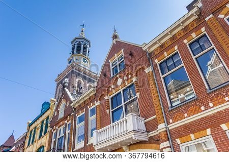 Old Houses In Front Of The Historic Tower Of Kampen, Netherlands