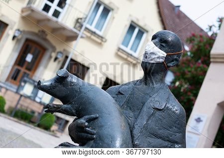 Niederstetten, Baden Wurttemberg, Germany - Mai 2020: Part Of The Statue Standing On The Market Plac