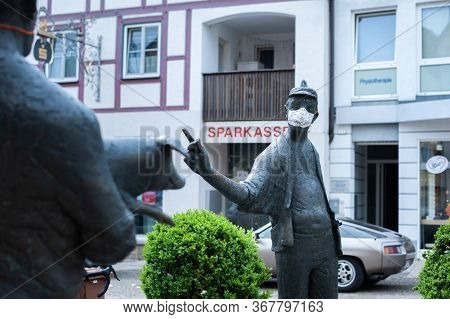 Niederstetten, Baden Wurttemberg, Germany - Mai 2020: Part Of The Statue Standing On The Market Plac