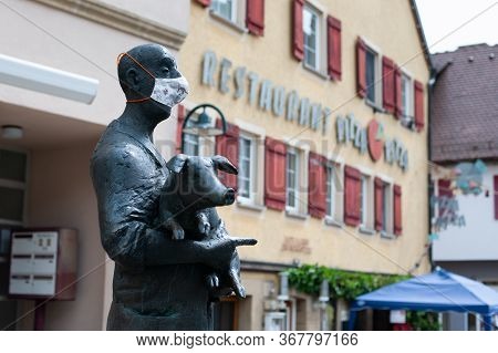 Niederstetten, Baden Wurttemberg, Germany - Mai 2020: Part Of The Statue Standing On The Market Plac