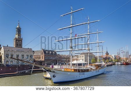 Kampen, Netherlands - April 22, 2020: Historic Sailing Ship At The Quay Of The River Ijssel In Kampe