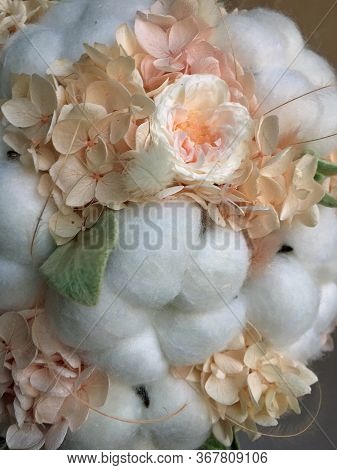 Flower Arrangement Cotton Blooms In White, Roses In A Beautiful Blend Of Peach, Light Peach And Whit