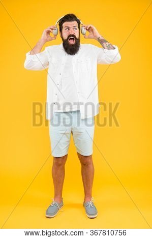 Its Too Loud. Shouting Bearded Man In Headphones Listening To Music. Mature Hipster With Beard. Dj I