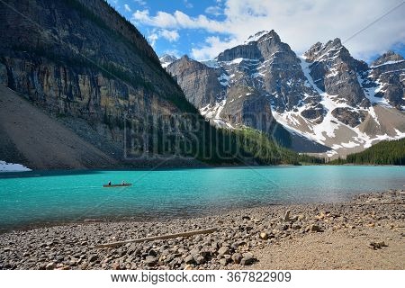 Moraine Lake Is A Glacially Fed Lake In Banff National Park, 14 Kilometres (8.7 Mi) Outside The Vill