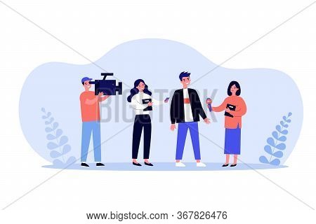 Female Journalists With Microphones Interviewing Man. Operator Shooting Reporters Conversation With 