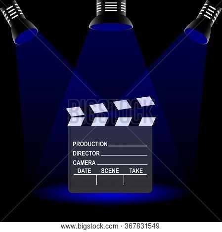 Clapperboard Used In Filmmaking With Text And Three Spotlights