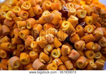 Candied Orange Peel. Candied Fruits On The Counter Of The Turkish Market. Rolled Orange Peel. Turkis