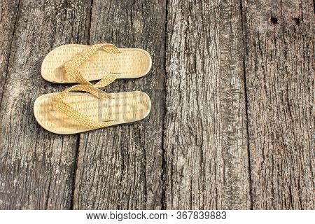 Shoe Weave,in Front Of The Hotel Room On The Old Wood Texture.