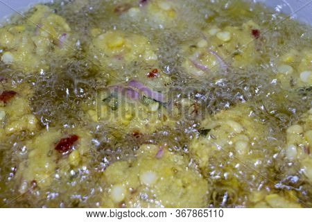 Fried Cook Of  Batate Vade, Batate Vadey, Fried Dhal Beans Cake Or Kuih Vadey Closeup. Indian Tradit