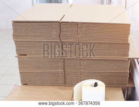A Stack Of Cardboard Sheets For Packing Boxes In Production. Pulp, Waste Paper, Structure, Carton
