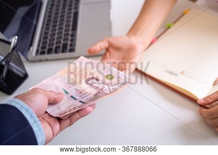 The Boss Pays The Employees The Salary Is The Compensation For The Work They Do. Thai Currency And T