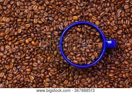 Blue Tin Mug Full Of Coffee Beans. Fair Trade. Commodity Trade. Fresh Coffee Beans.