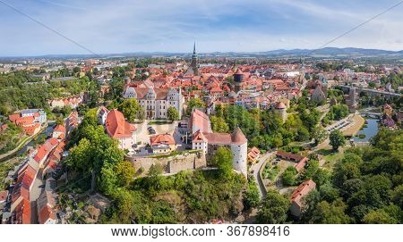 Bautzen, Germany. Aerial Cityscape Of Old Town With Ortenburg Castle On Foreground
