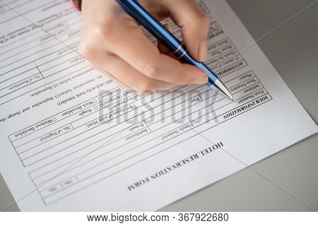 Woman Filling Hotel Reservation Form Putting First Name. Reception Desk. Hotel Service, Registration
