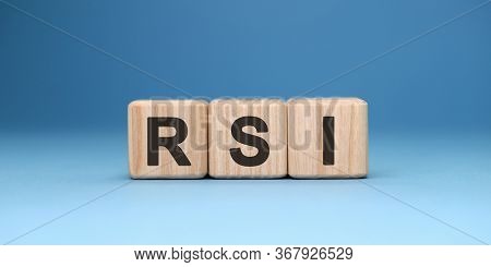 Rsi Word Cube On A Blue Background. Business Concept.