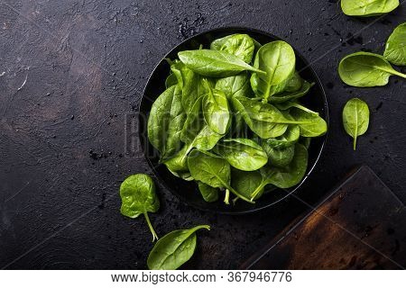 Fresh Baby Spinach On A Plate. Juicy Spinach Leaves. Diet Concept. Vegan Food.juicy Spinach Leaves. 