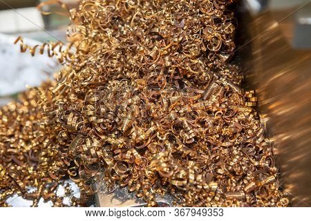 Close-up Scene Of Pile Of Turning Chip From Cnc Lathe.the Brass Chip From Turning Process.