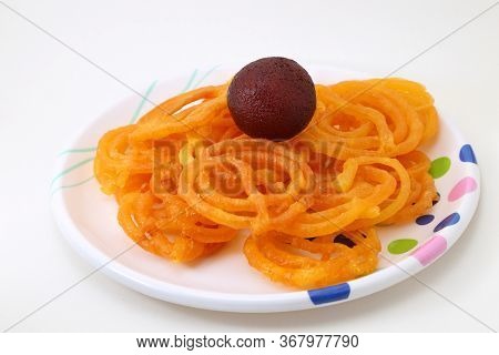Indian Sweet Or Dessert Jalebi With Kala Gulab Jamun