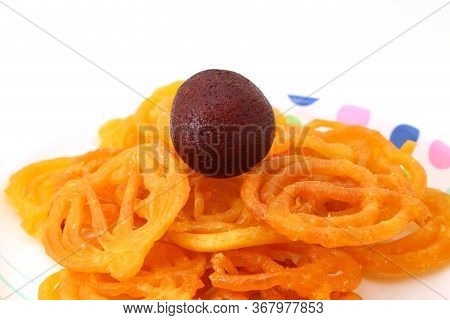 Indian Sweet Or Dessert Jalebi With Kala Gulab Jamun