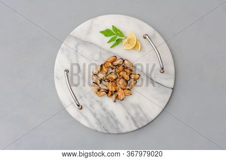 Mussels Without Shell On A Marble Tray. Seafood Concept. Top View. Space For Text