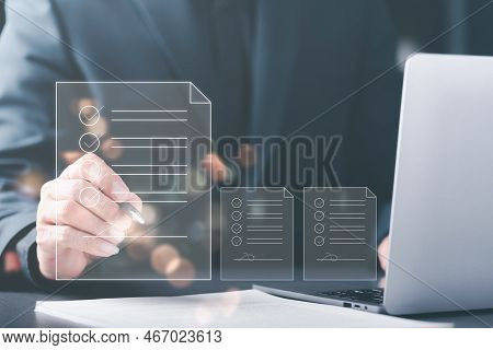 A Man Reviewing And Managing Business Documents And Agreements Online,signing A Business Contract Ap