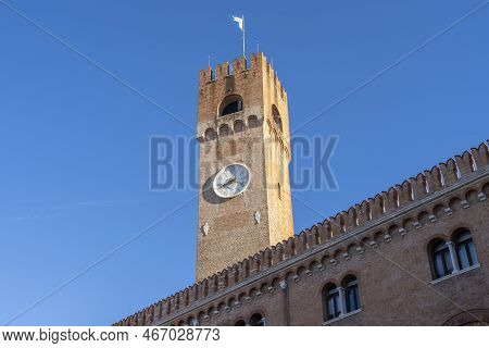 Watch Tower In The City Center Of Treviso, Italy. Beautiful Piazza Dei Signori Is The Palazzo Dei Tr