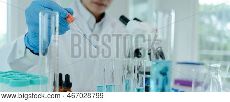 Scientist Analyze Biochemical Samples In Advanced Scientific Laboratory. Medical Professional Use Dr