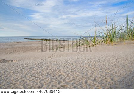 Autumn On The Baltic Sea Coast, Dunes, Grass, Beach, White Sand, Harbor Breakwater, Rewal, Poland.