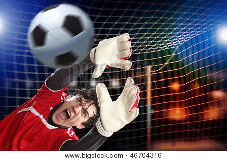 Torwart fängt den ball