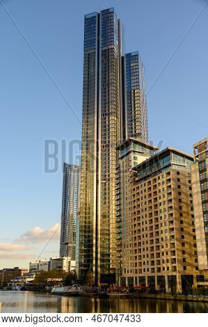 London - November 4, 2020: Hampton Tower, South Quay Plaza, Canary Wharf Bathed In Golden Setting Su