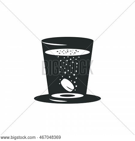 Effervescent Tablet Or Carbon Tablet In A Glass Of Water With The Release Of Carbon Dioxide Bubbles,