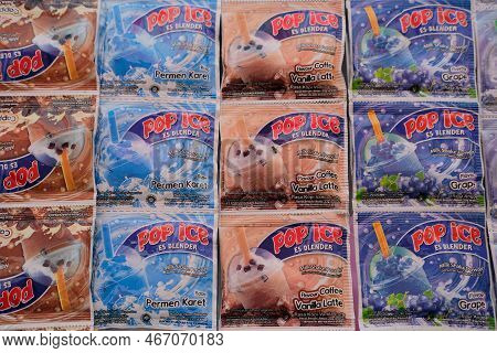 Temanggung, Indonesia - 07 December 2022: Pop Ice Es Blender Sachet Product. Pop Ice Sachet Display.