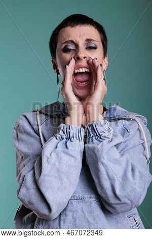Upset Frustrated Female Aggressively Screeming In Front Of Camera While Being Anger About The News. 