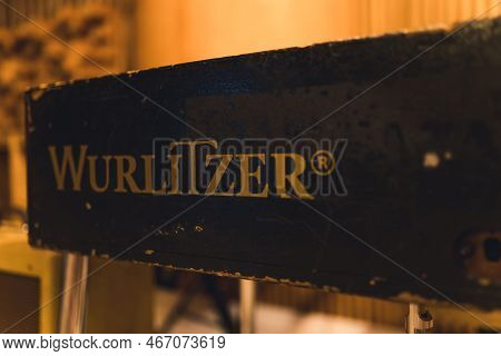11.17.2022 Warsaw, Poland. Closeup Of Wurlitzer Logo On Black Background. Garage Band Concept. Equip