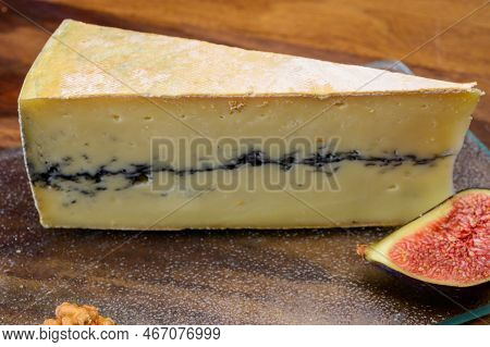 French Semi-soft Cow Milk Cheese Morbier From Franche-comte Region With Thin Black Layer And Strong