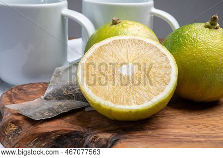 Fresh Ripe Bergamot Orange Fruits And Tea Bags, Fragrant Citrus Used In Earl Grey Tea, Medicine And