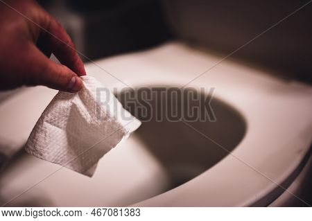 Disposable Wipes Being Flushed Down A Toilet Where They Can Cause Clogging And Problems With Wastewa