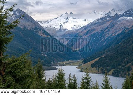 Gabler, Reichenspitze And Hahnenkamm Peaks Covered In Snow And Ice On A Cloudy, Rainy Day Of Autumn.