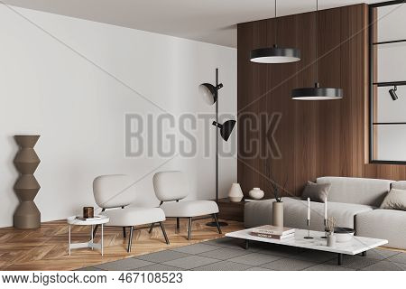 Corner View On Bright Living Room Interior With White Wall, Armchairs, Sofa, Coffee Table With Books