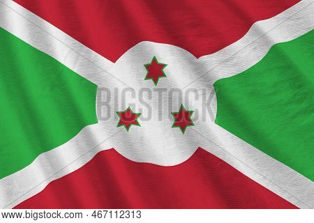 Burundi Flag With Big Folds Waving Close Up Under The Studio Light Indoors. The Official Symbols And